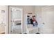 Bright hallway with storage bench and view of bedroom at 2178 Grist Mill Dr, Concord, NC 28025