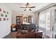 Bright home office with built-in shelving and a spacious desk at 2178 Grist Mill Dr, Concord, NC 28025