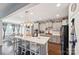 Modern kitchen boasts white cabinets and an expansive island at 2178 Grist Mill Dr, Concord, NC 28025