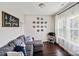 Cozy living room featuring a comfortable sectional sofa and large windows at 2178 Grist Mill Dr, Concord, NC 28025