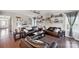 Bright living room with hardwood floors, comfy seating and lots of natural light at 2178 Grist Mill Dr, Concord, NC 28025