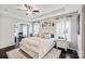 Main bedroom with a king-size bed and attached bathroom at 2178 Grist Mill Dr, Concord, NC 28025