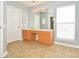 Bathroom with double vanity and tile flooring at 247 Aylesbury Ln, Indian Trail, NC 28079