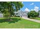 Charming two-story home with a well-manicured lawn, two-car garage, and inviting curb appeal at 247 Aylesbury Ln, Indian Trail, NC 28079