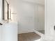 Modern bathroom featuring a glass-enclosed shower, sleek vanity, and contemporary fixtures at 2832 Arcadia Ave, Charlotte, NC 28209