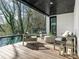 Relaxing outdoor deck with comfortable seating, a modern design and a view of the sparkling pool at 2832 Arcadia Ave, Charlotte, NC 28209