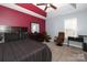 Spacious bedroom with two accent chairs and a desk at 3111 Hendricks Chapel Ln, Charlotte, NC 28216