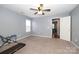 Large bedroom with home gym and access to hallway at 3111 Hendricks Chapel Ln, Charlotte, NC 28216