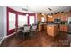 Kitchen with granite countertops and wood cabinets at 3111 Hendricks Chapel Ln, Charlotte, NC 28216