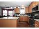 Kitchen features granite countertops and stainless steel appliances at 3111 Hendricks Chapel Ln, Charlotte, NC 28216