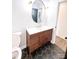 Bathroom with hexagon tile floor and updated vanity at 318 S Rhyne St, Dallas, NC 28034