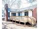 New wooden deck with steps leading to backyard at 318 S Rhyne St, Dallas, NC 28034