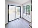 Bright dining area with sliding glass doors leading to deck at 318 S Rhyne St, Dallas, NC 28034