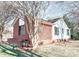 Brick ranch house with mature trees and landscaping at 318 S Rhyne St, Dallas, NC 28034