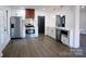 Modern kitchen with stainless steel appliances and white cabinetry at 318 S Rhyne St, Dallas, NC 28034