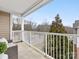 Private balcony offers wooded views and a relaxing outdoor space at 3264 Margellina Dr, Charlotte, NC 28210