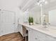 Double vanity bathroom with a large mirror and a walk in shower at 3264 Margellina Dr, Charlotte, NC 28210