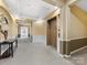 Building hallway with elevator access and neutral decor at 3264 Margellina Dr, Charlotte, NC 28210