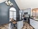 Bright kitchen includes stainless steel appliances, an island with seating, and a large window providing ample natural light at 3605 Truxton Ct, Waxhaw, NC 28173