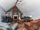 Living room with fireplace, vaulted ceiling, and hardwood floors at 3605 Truxton Ct, Waxhaw, NC 28173