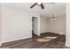 Simple dining room with hardwood floors and access to kitchen at 50005 Guy Ln, Norwood, NC 28128