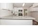 Modern kitchen with white cabinets and granite countertops at 50005 Guy Ln, Norwood, NC 28128