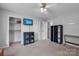 Versatile bedroom with shelving unit, closet, and desk at 603 Helms Dr, Lowell, NC 28098