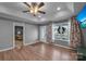 Living room with hardwood floors and ceiling fan at 603 Helms Dr, Lowell, NC 28098