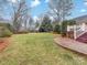 Grass backyard with a patio and a deck at 6716 Ronda Ave, Charlotte, NC 28211