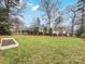 Large backyard with deck and garden area at 6716 Ronda Ave, Charlotte, NC 28211