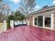 Spacious deck with seating area and access to the house at 6716 Ronda Ave, Charlotte, NC 28211