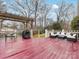 Spacious deck with seating area, pergola, and grill at 6716 Ronda Ave, Charlotte, NC 28211