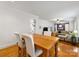 Open dining room with hardwood floors and view of living room and kitchen at 6716 Ronda Ave, Charlotte, NC 28211