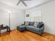 Home office with sectional sofa and hardwood floors at 6716 Ronda Ave, Charlotte, NC 28211