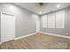 Spacious bedroom with wood flooring and neutral walls at 7117 W Sugar Creek Rd, Charlotte, NC 28269