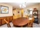 The dining room features a wooden table, seating for six, and access to the kitchen at 749 21St Ne Ave, Hickory, NC 28601