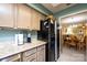 Kitchen with granite countertops, modern appliances, and an open view into the dining room at 749 21St Ne Ave, Hickory, NC 28601