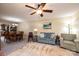 Living room with ceiling fan, neutral paint, comfortable seating, and an open layout at 749 21St Ne Ave, Hickory, NC 28601