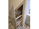 Under-stair pantry with shelving and space for appliances and storage at 800 Parkette St, Concord, NC 28027