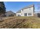 Spacious backyard with wooden fence and shed at 8018 Trotter Rd, Charlotte, NC 28216