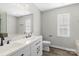 Double vanity bathroom with soaking tub and shower at 8018 Trotter Rd, Charlotte, NC 28216