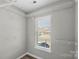 Walk-in closet with wire shelving and window at 8018 Trotter Rd, Charlotte, NC 28216