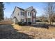 Two-story house with gray siding and brick accents at 8018 Trotter Rd, Charlotte, NC 28216