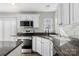 Modern kitchen with stainless steel appliances and granite countertops at 8018 Trotter Rd, Charlotte, NC 28216