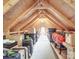 Unfinished attic provides ample storage space with shelving and room for boxes at 8100 Avanti Dr, Waxhaw, NC 28173