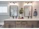 Elegant bathroom with double vanity, quartz countertops, and modern fixtures at 8100 Avanti Dr, Waxhaw, NC 28173