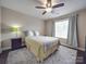 Bright bedroom featuring a comfortable bed and ample natural light at 8100 Avanti Dr, Waxhaw, NC 28173