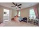 Cozy bedroom with a comfortable bed and built-in shelving at 8100 Avanti Dr, Waxhaw, NC 28173