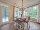 Breakfast nook with light wood table, bench seating, and plenty of natural light at 8100 Avanti Dr, Waxhaw, NC 28173