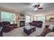 Spacious living room with fireplace and ample natural light at 8100 Avanti Dr, Waxhaw, NC 28173